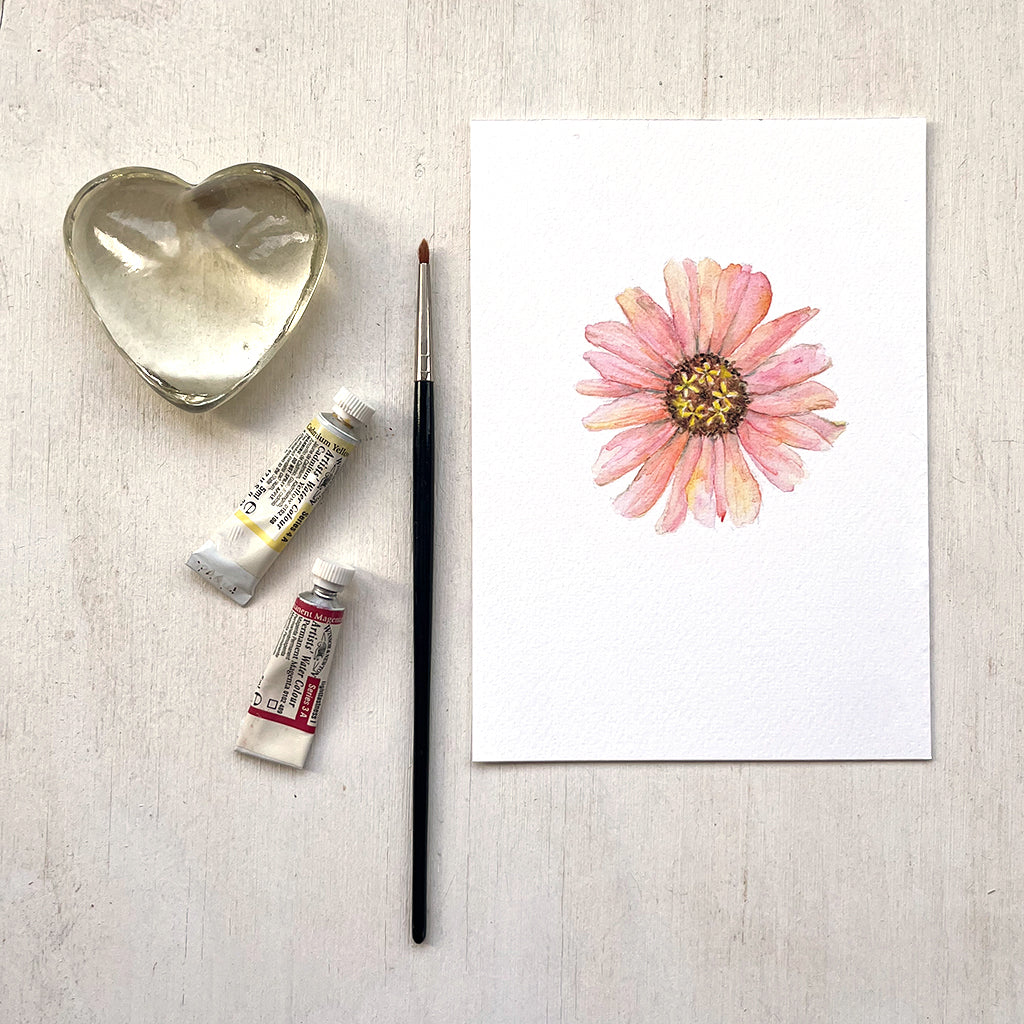 A watercolor painting of a beautiful peach-colored zinnia flower. Available as 5x7 print.